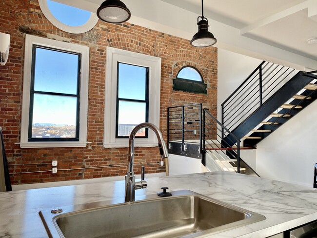 Kitchen to Living area - Mechanics Building Apartments
