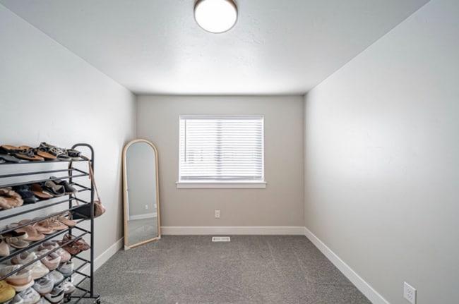 Photo - AWESOME END UNIT with attached 2 stall garage and additional personal parking spot on the exterior