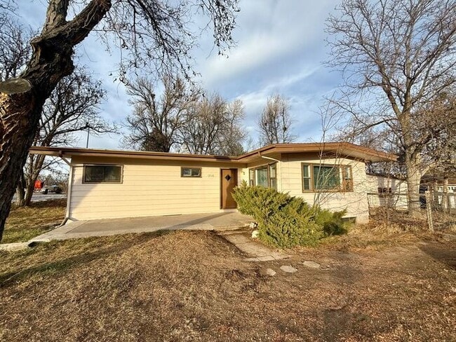 Building Photo - Charming Vintage Home on a Large Corner Lot with 3-Car Detached Garage/Shop!