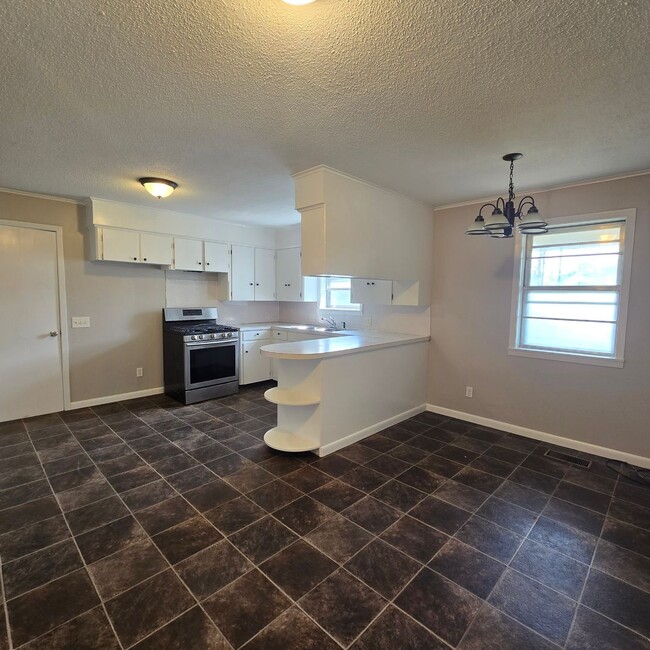 Photo - Beautiful Home with Storage and a corner Lot!