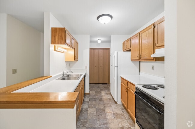 2BR, 1BA - 1,000SF - Kitchen - Westbriar Senior Apartments