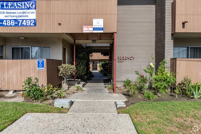 Entrada - 10327 Downey Ave.