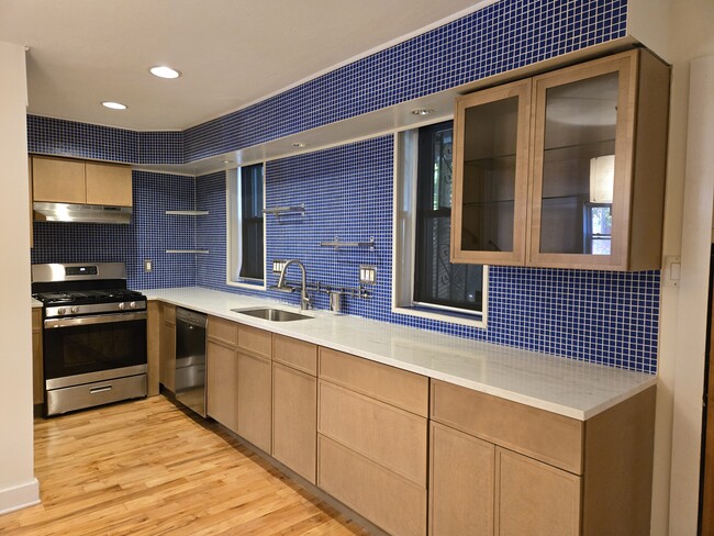 Brand new cabinets, countertop and range. - 862 N Lawrence St House