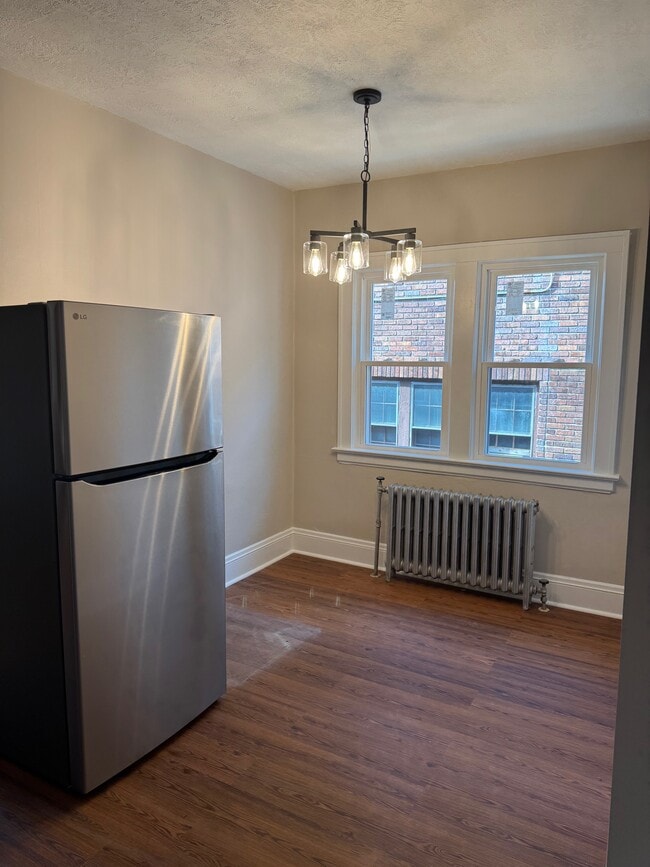 Área de la mesa de la cocina - Helene Apartments