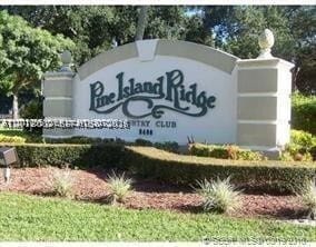 Building Photo - 9470 Live Oak Pl Unit 306