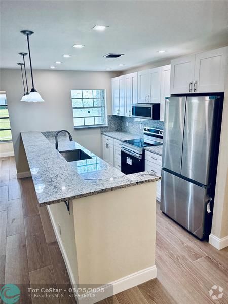 Building Photo - 14676 Canalview Dr Unit C Rental