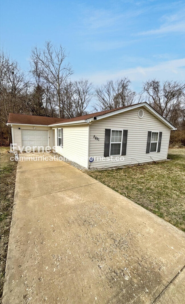 Building Photo - 5821 Weeks Ave