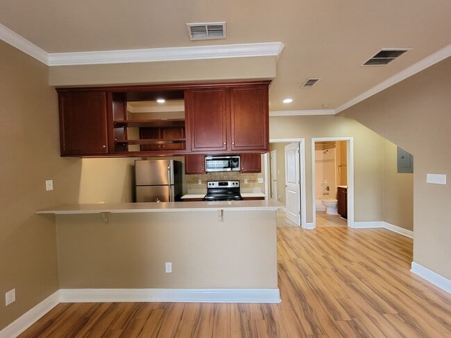 Building Photo - 3 Bedroom town home for rent August 6, 2026 in gated community with pool, renting for $1550 per m...