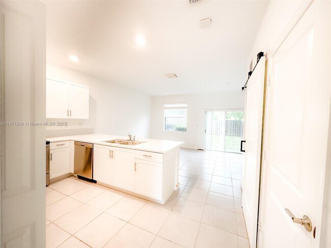 Photo - 1486 SE 26th Ter Unit key gare