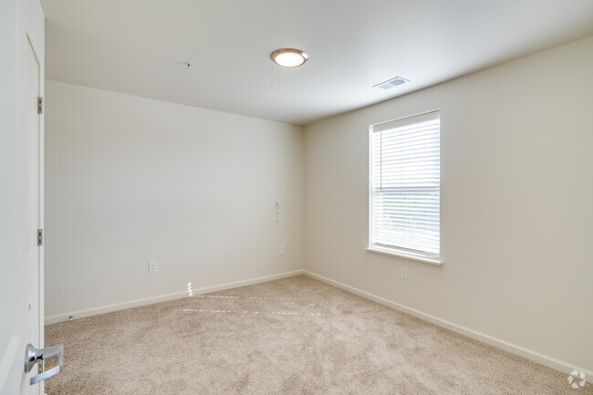 2BR, 1.5BA - 940SF - Bedroom - Taylor Crossing Senior Apartments