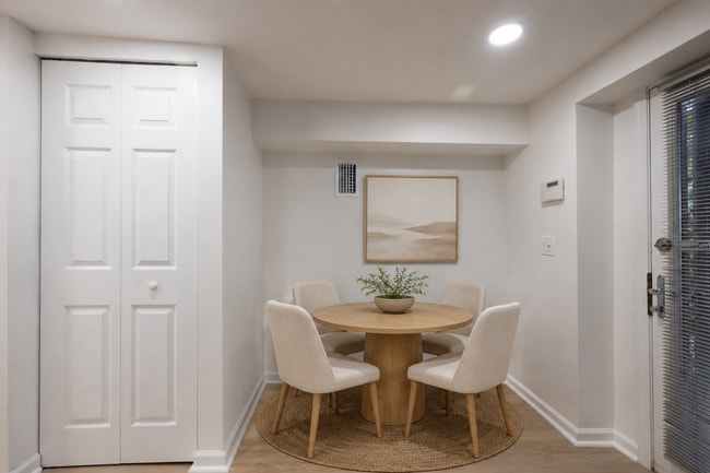 Digitally Staged Dining Area - 3223 1st St N