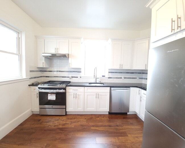 Photo - Renovated 3 Bed / 2 Bath in Allston | In-Unit Laundry | 9/1