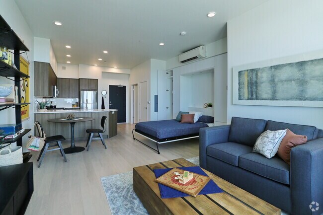 Spacious living room with couch