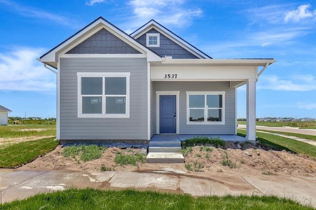 Building Photo - Modern 3-Bed Ranch in Maize – Zero-Entry L...