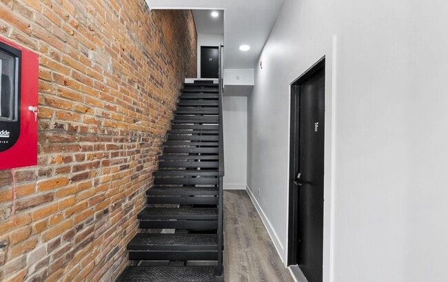 Photo - Gorgeous 2-Bed/2-Bath Apartment with Private Backyard! Available NOW! Unit 1R