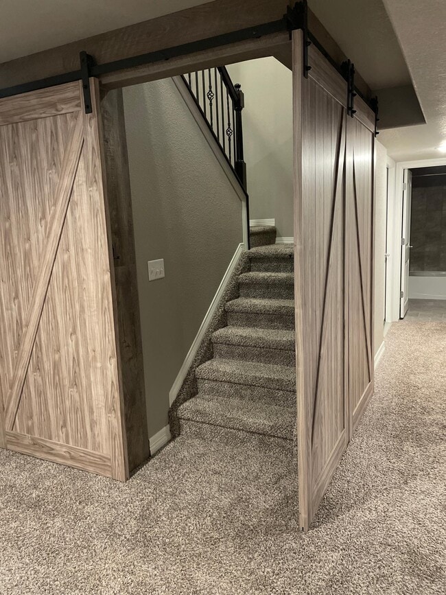 Stairs enclosed for privacy - 5383 Homeward Dr