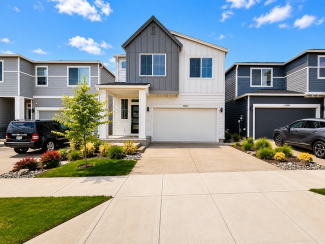 Photo - Stunning 2024 Built 5BR Home with Main-Level Suite, EV Charger & Covered Patio Near River Terrace
