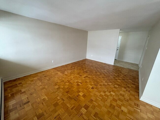 Building Photo - 1061 Queen's Blvd Unit 704