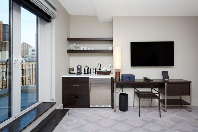 Photo - 114 E 32nd St Unit ID1290326P