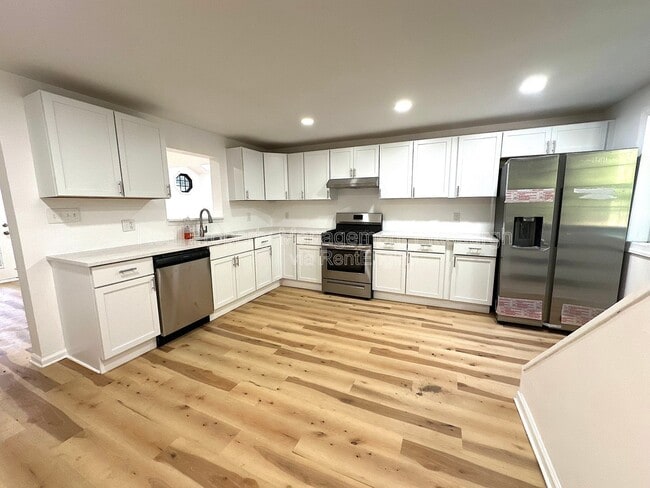 Building Photo - 6174 Poketa Rd