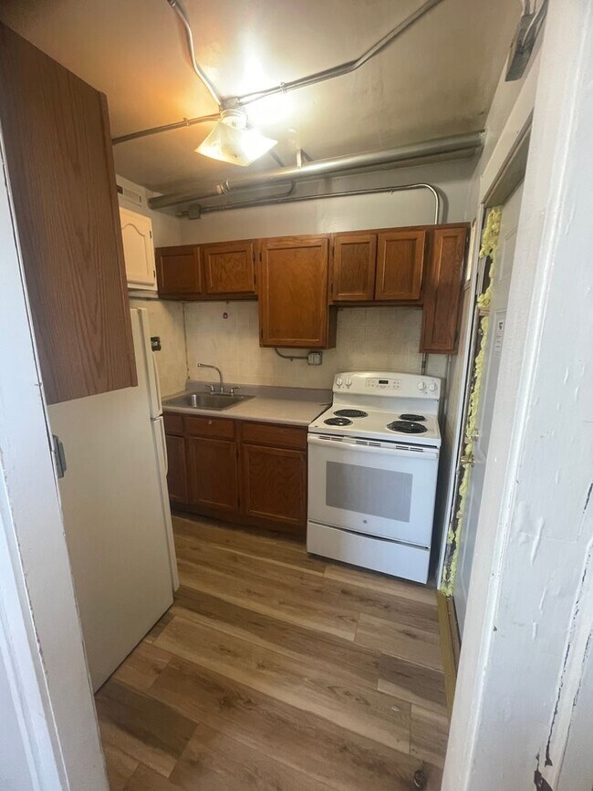 Photo - 609 Wellington Ct Unidad D5