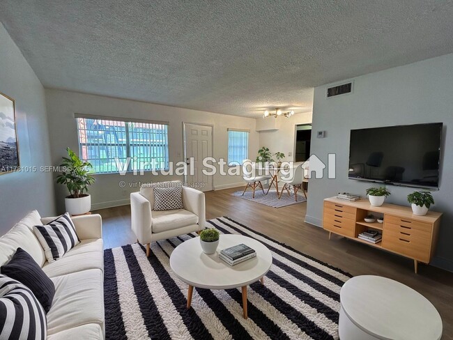 Building Photo - 1201 SW 50th Ave Unit 105-4