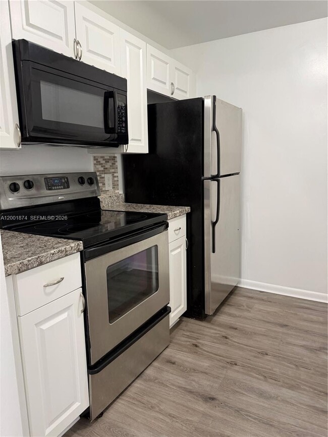 Building Photo - 800 SW 131st Ave Unit 311F
