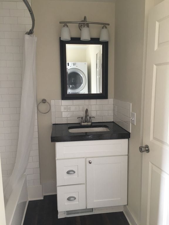 bathroom with in-unit laundry - 317 Laurel Street West Unit 1