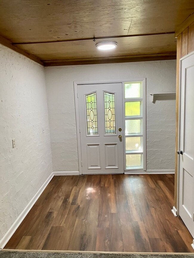 Building Photo - Cozy 1/1 duplex Unit E1