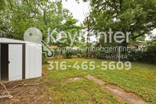 Photo - Charming 3-Bedroom Home with Original Hardwood Floors & Large Backyard