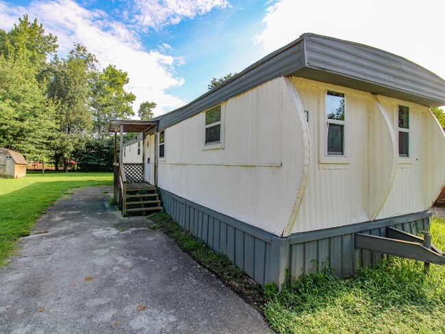 Building Photo - Move-In Ready • Water & Lawn Care Included!