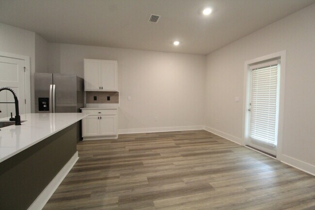 Photo - Modern 4BR Home in Reserve at Brookhaven with Quartz Kitchen, Smart Home Features & Open Floor Plan