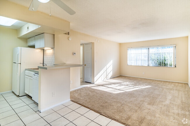2BR, 1BA - 910SF - Living Room, Kitchen and Dining Room
