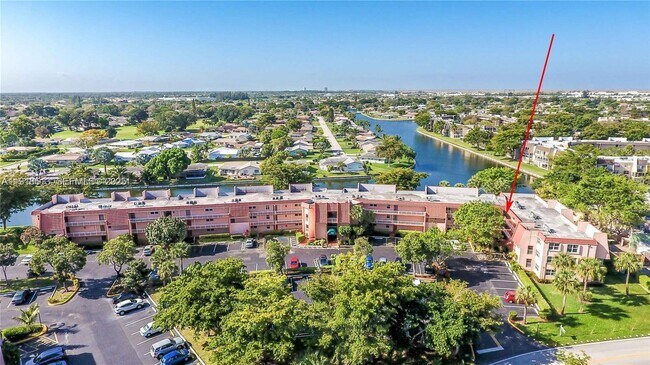 Building Photo - 9150 Lime Bay Blvd Unit 212