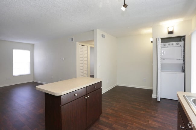 1BD/1BA - 850 SqFt (Living Room/Laundry)