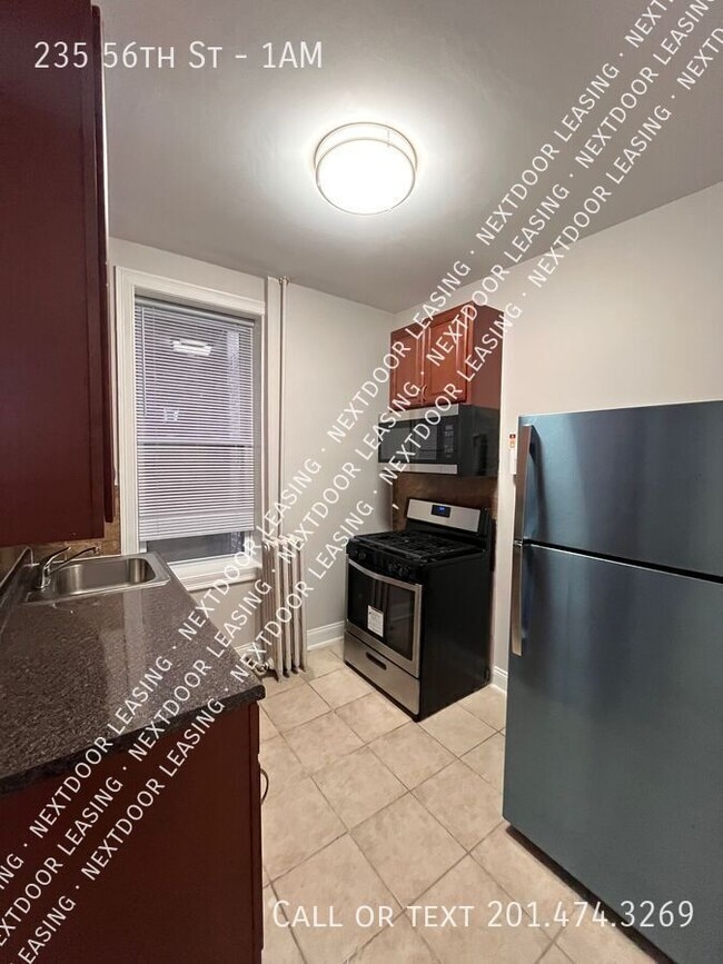 Building Photo - 235 56th St Unit 1AM