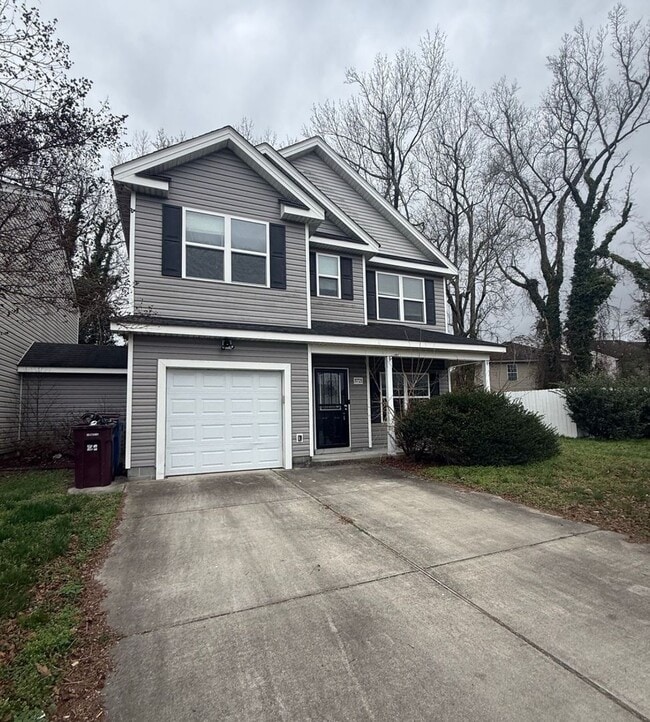 Photo - Spacious 4BR Home with Large Fenced Yard & Prime Location