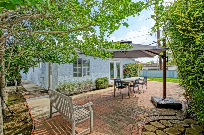 Photo - CHARMING & AIRY HOME W/ SPACIOUS FENCED YARD & LARGE 2-CAR GARAGE CLOSE TO SCHOOLS, SHOPPING & MI...