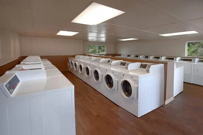 On-Site Laundry Room - The Crossings Apartments