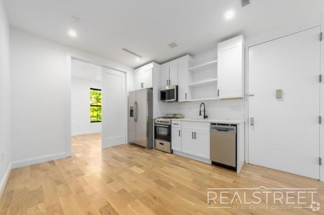 Building Photo - 3 bedroom in BROOKLYN NY 11233 Unit 2 Rental