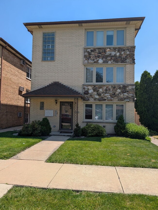 Building Photo - 2411 N 77th Ct Unit 1