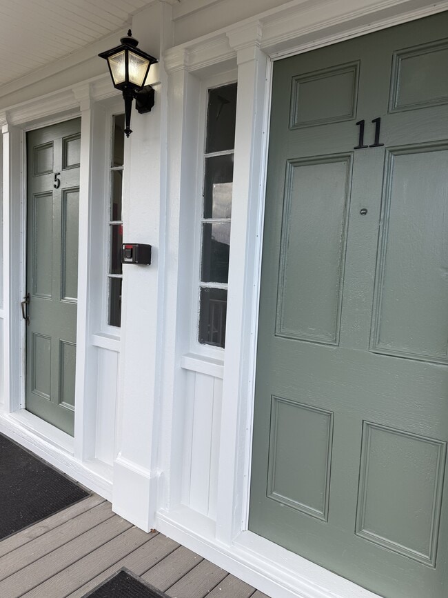 Freshly painted entrances to apartment community - 5 Chapel St