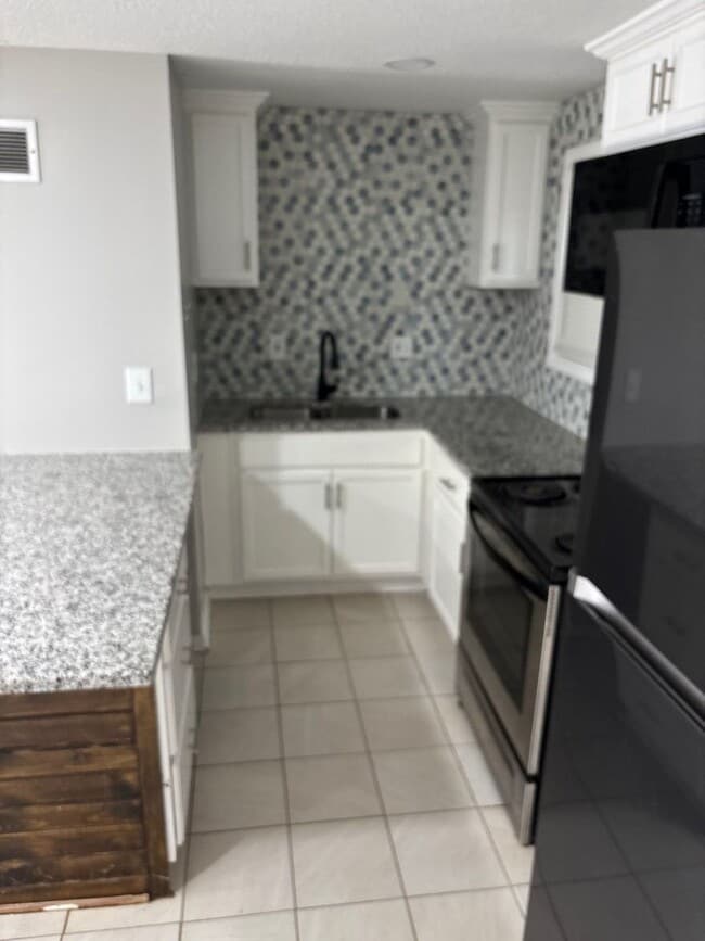 Building Photo - 1805-1807 Brookside Ave Independence, MO 64052 Unit 1807 Brookside Ave