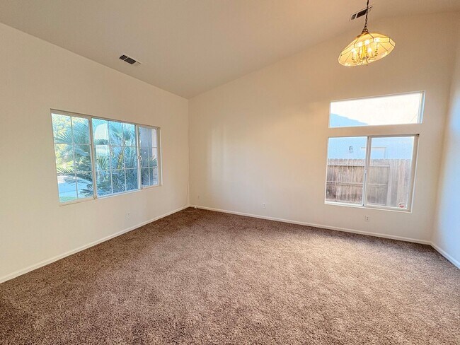 Photo - Spacious Two-Story Family Home with Large Yards & Open Kitchen