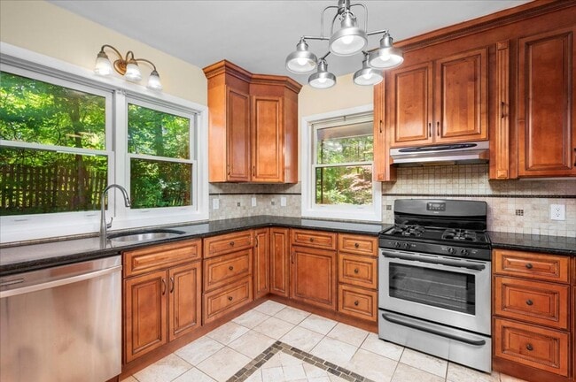 Photo - Elegant Multi-Level Brick Residence with Outdoor Oasis