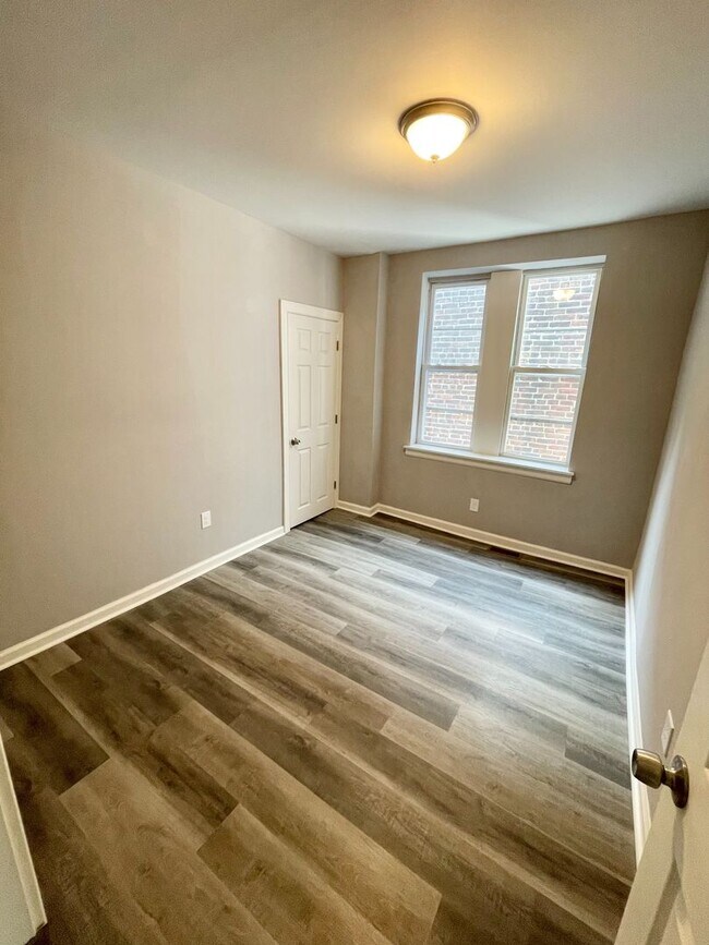 Photo - Move-In Ready 4BR Home with Bright Interiors & Ample Storage