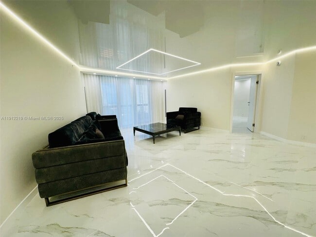 Building Photo - 3500 Mystic Pointe Dr Unit 1107