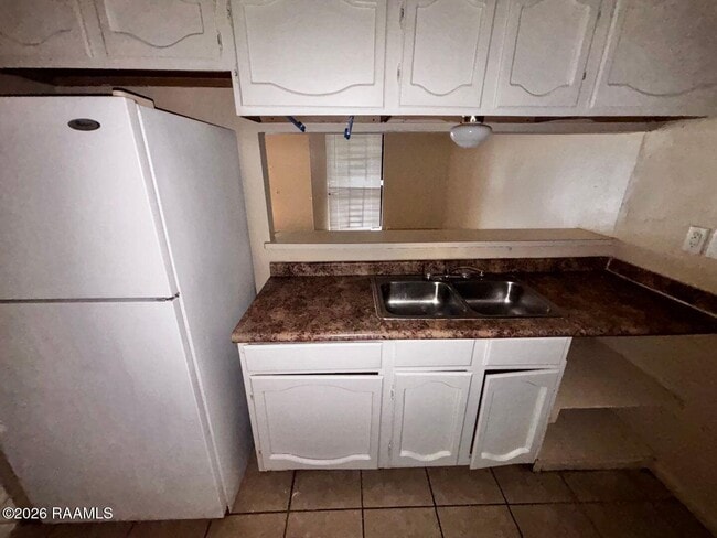 Photo - 102 Marigny Cir Unidad D