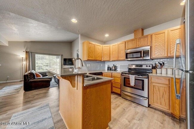 Photo - Beautiful Updated 3 Bedroom Condo with A/C, Garage & Fireplace in Forsythia Place!