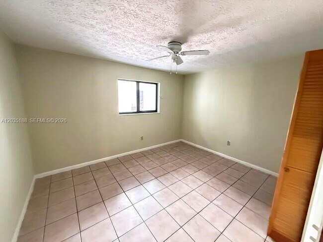 Building Photo - 6055 W 19th Ave Unit 305